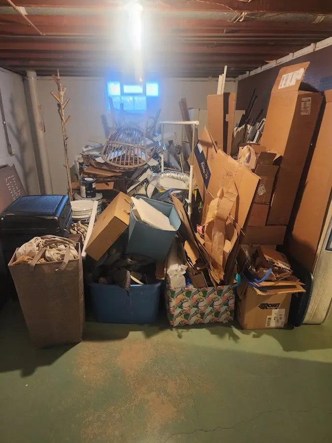 Roll-off dumpster container at job site for 4 Yard Dumpster Rental in Springboro